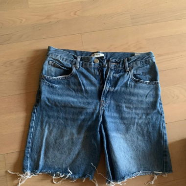 Bermuda in jeans con frange