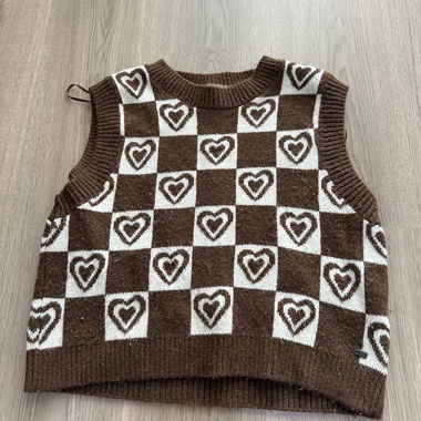 Brown and white knitted vest