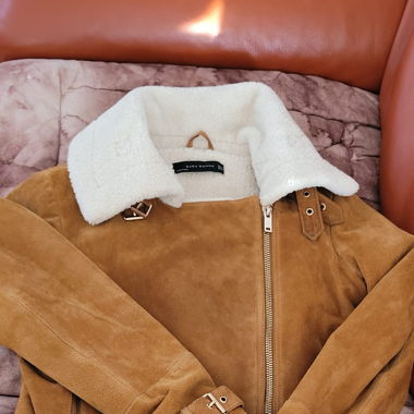 Veste en cuire de porc très belle frs.40.-