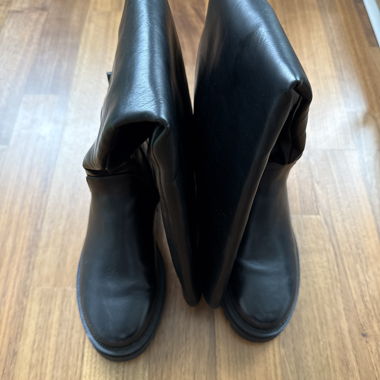 Black knee-high leather boots