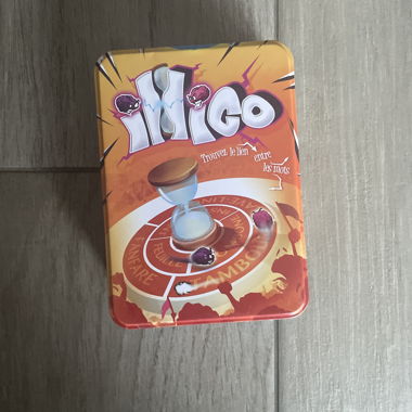 Migo board game in metal tin