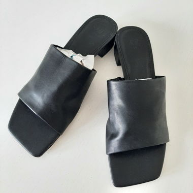 Black heeled mules