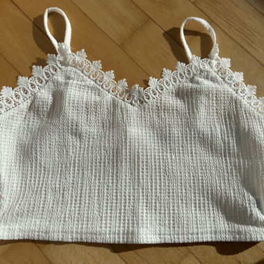 White top with lace details