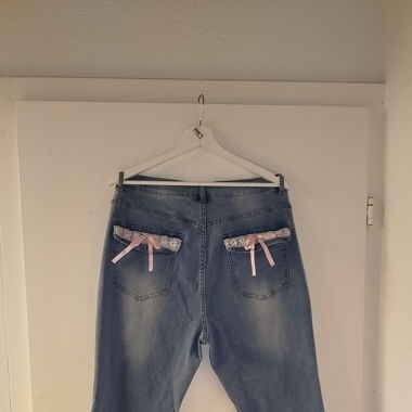 Coquette flared jeans
