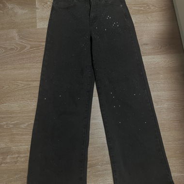 Jeans neri con glitter