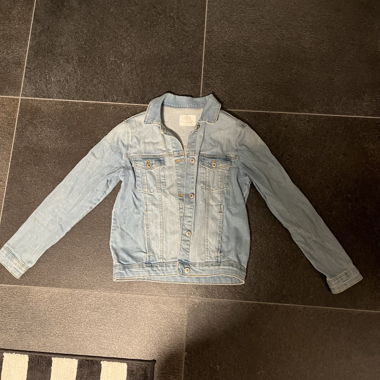giacca di jeans azzurro chiaro