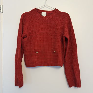 Pull rouge en maille avec poches