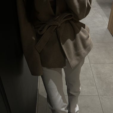 Beige short coat with tie belt