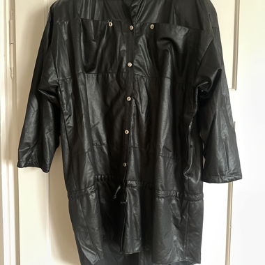 Blusa effetto wet look