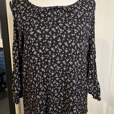 Black blouse with floral pattern