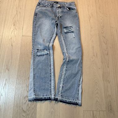 Jeans flare gris déchirés