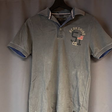 Polo grigia con ricamo