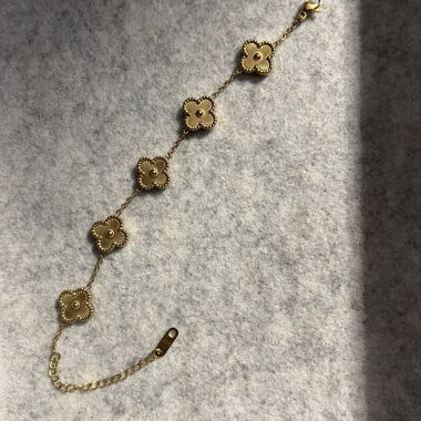 Bracelet fleurs dorées 