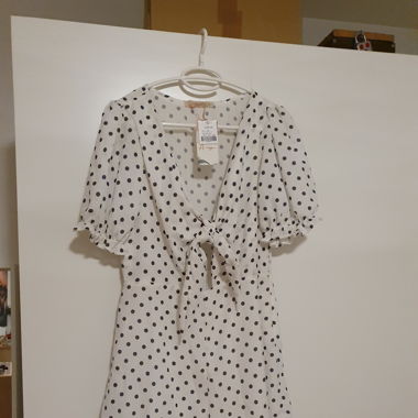 Combinaison blanche à pois