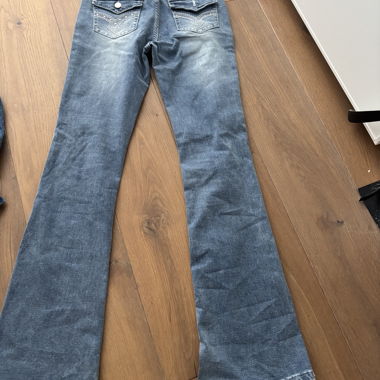 Blaue Bootcut-Jeans