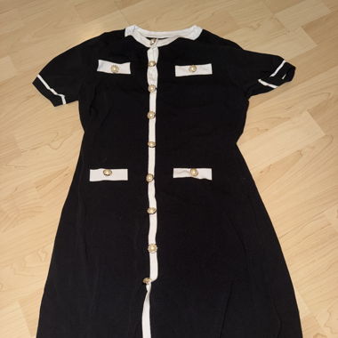 Black dress with white details