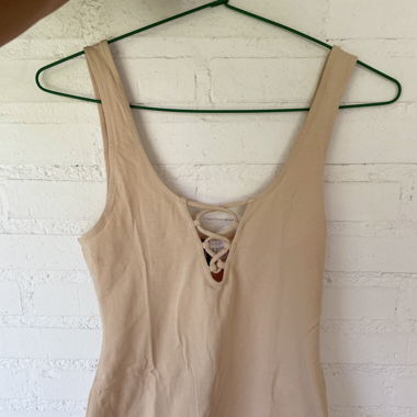 Tan body with bust laces. H&M