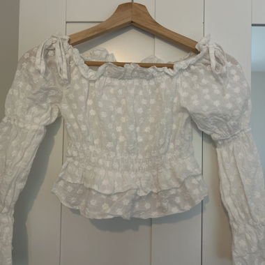 Blusa estiva con motivo floreale