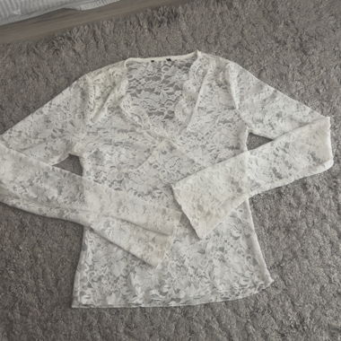 Blusa bianca in pizzo
