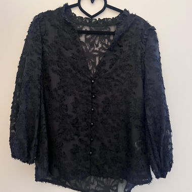 Blusa nera