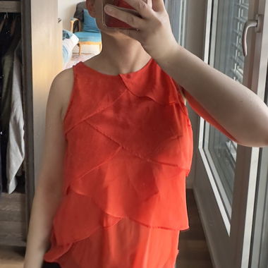 Top arancione senza maniche
