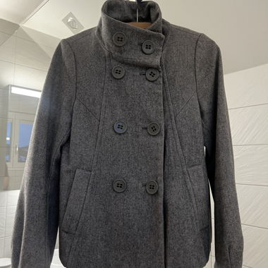 Coat with high collar