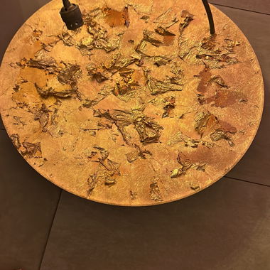 Runde goldene Wandleuchte
