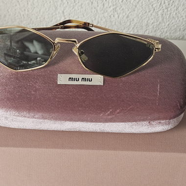 Lunettes de soleil Miu Miu