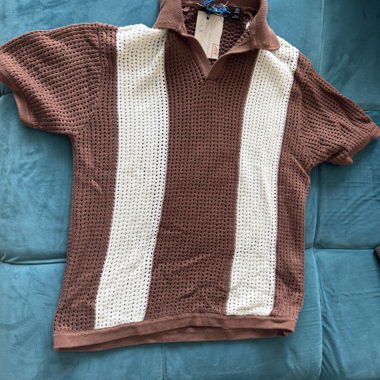 Brown and white striped knit polo