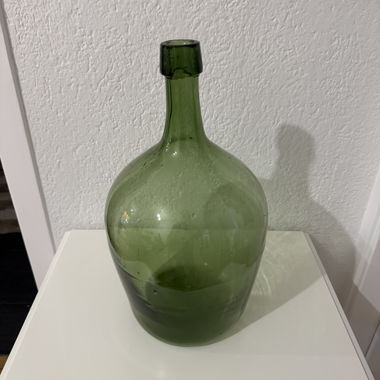 Large green glass bottle