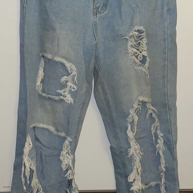 Set di jeans blu e top bianco