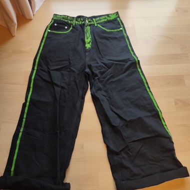 Black trousers with neon green details