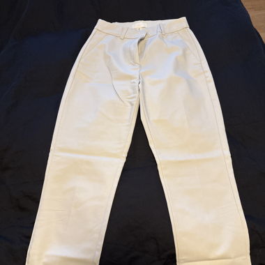 Pantaloni in tessuto crema / completo