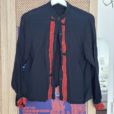 Women’s black and red blouse