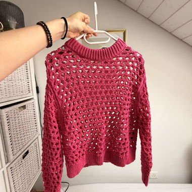 Pull en maille ajourée rose