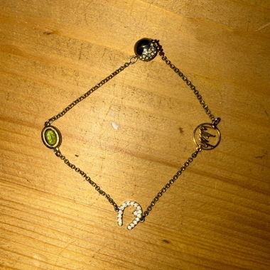 Bracciale con ciondoli a forma di ferro di cavallo