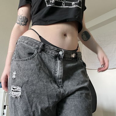 Dark grey baggy ripped jeans