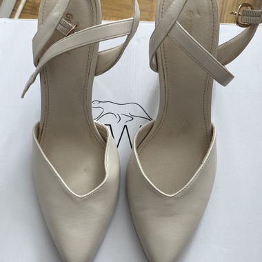 Beige pointed slingback heels