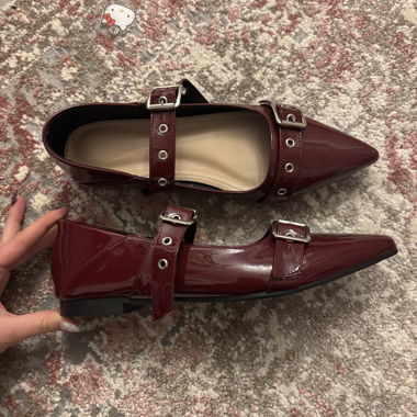 red ballerina flats with chrome details