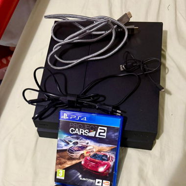 Ps4 avec 1 cd et une manette 1tera 