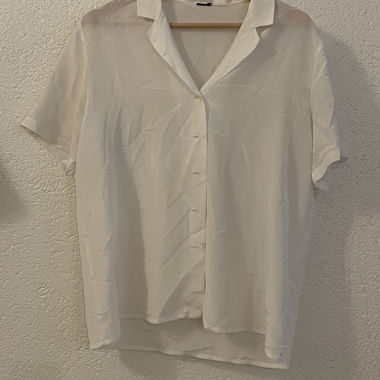 Blouse blanche sans manche