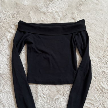 Black top with off-shoulder design