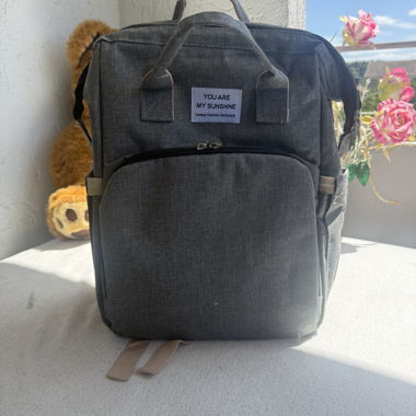 Zaino avvolgente grigio incluso lettino per bambini
