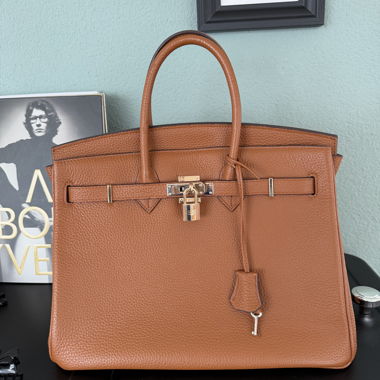 Borsa a mano in pelle marrone nello stile Birkin