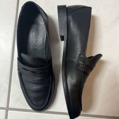 Black leather loafers
