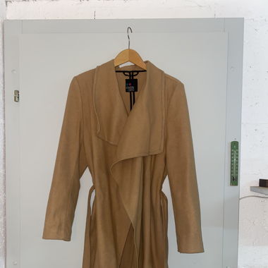 Trench beige en tissus 