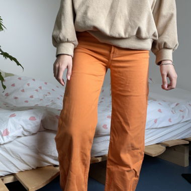 Orange flared pants