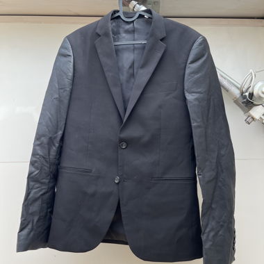 Blazer with faux leather sleeves