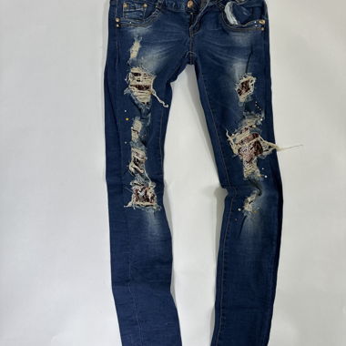 Jean skinny déchiré et orné