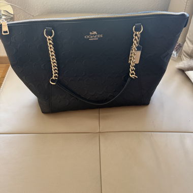 Borsa shopper Coach nera con catena dorata